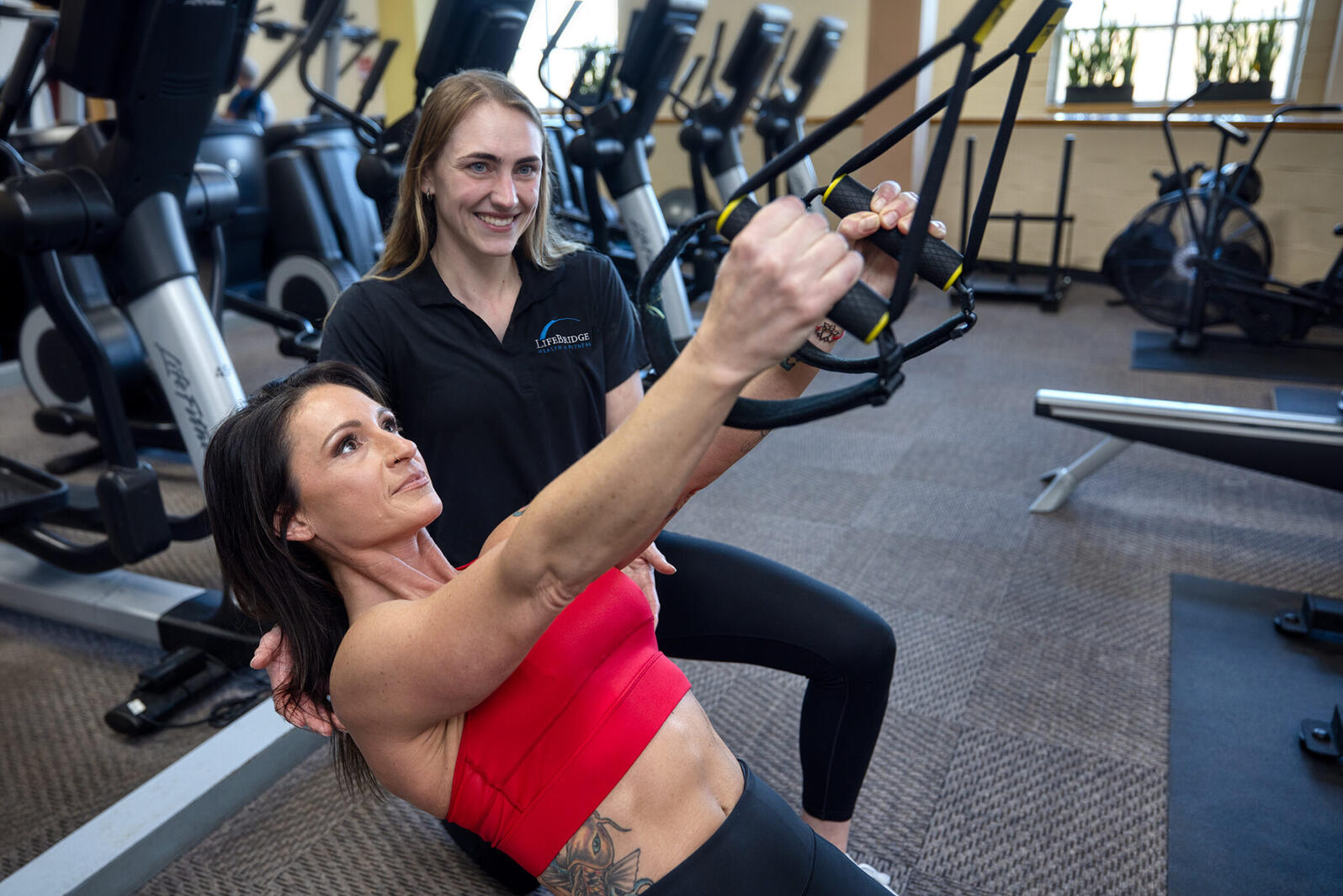 Personal Training Personal trainer working with client
